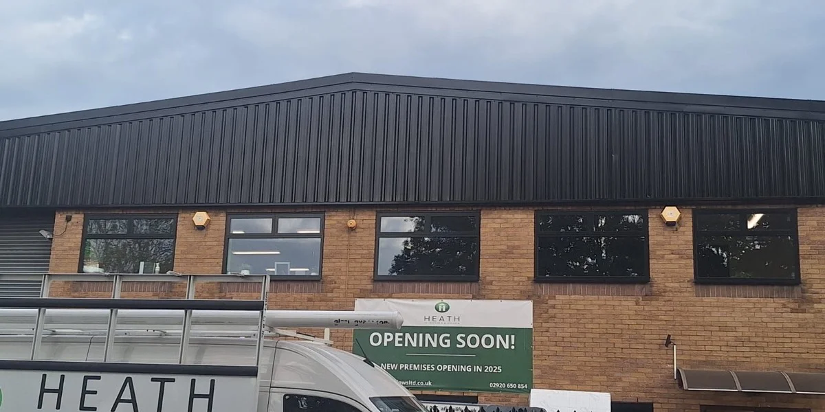 Profiled steel cladding resprayed dark anthracite at commercial premises on Bessemer Road, Cardiff by Vanda Coatings