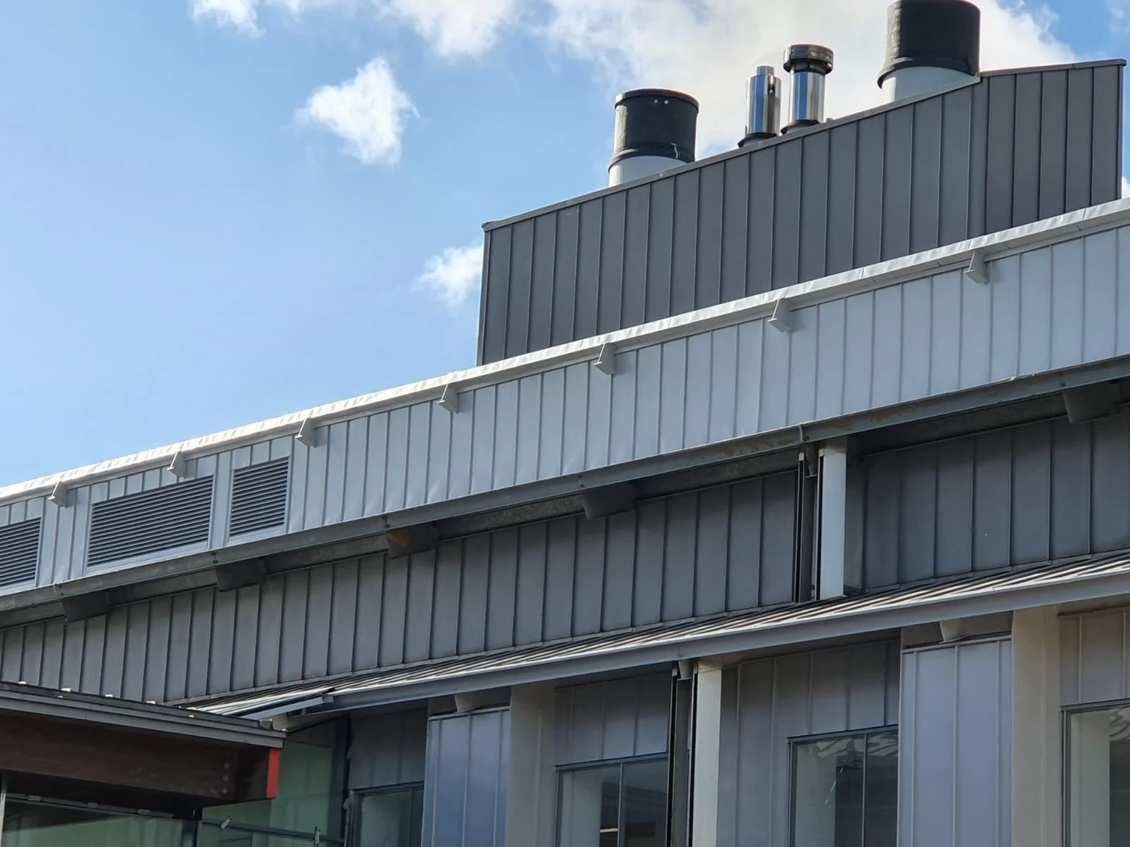 Steel cladding facade at Cambridge Science and Technology Park after recoating by Vanda Coatings