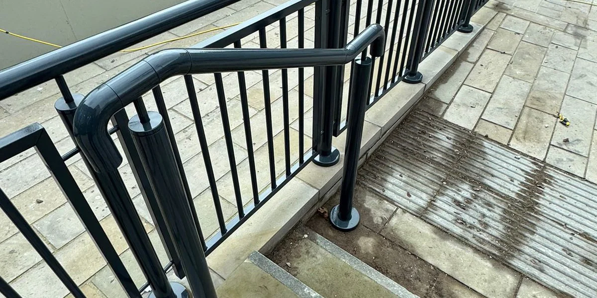 External steel balustrade and handrail sprayed dark anthracite at Manchester city centre development by Vanda Coatings