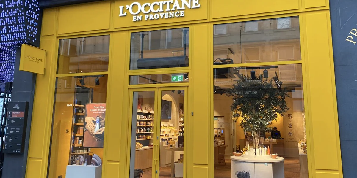 L'Occitane en Provence Glasgow shop front after recoating by Vanda Coatings, bright yellow frame finish