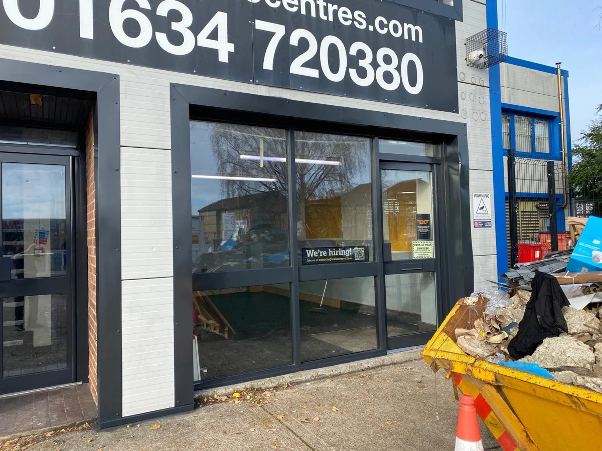 Completed entrance section at Halfords Autocentre Strood, dark anthracite frames on completion