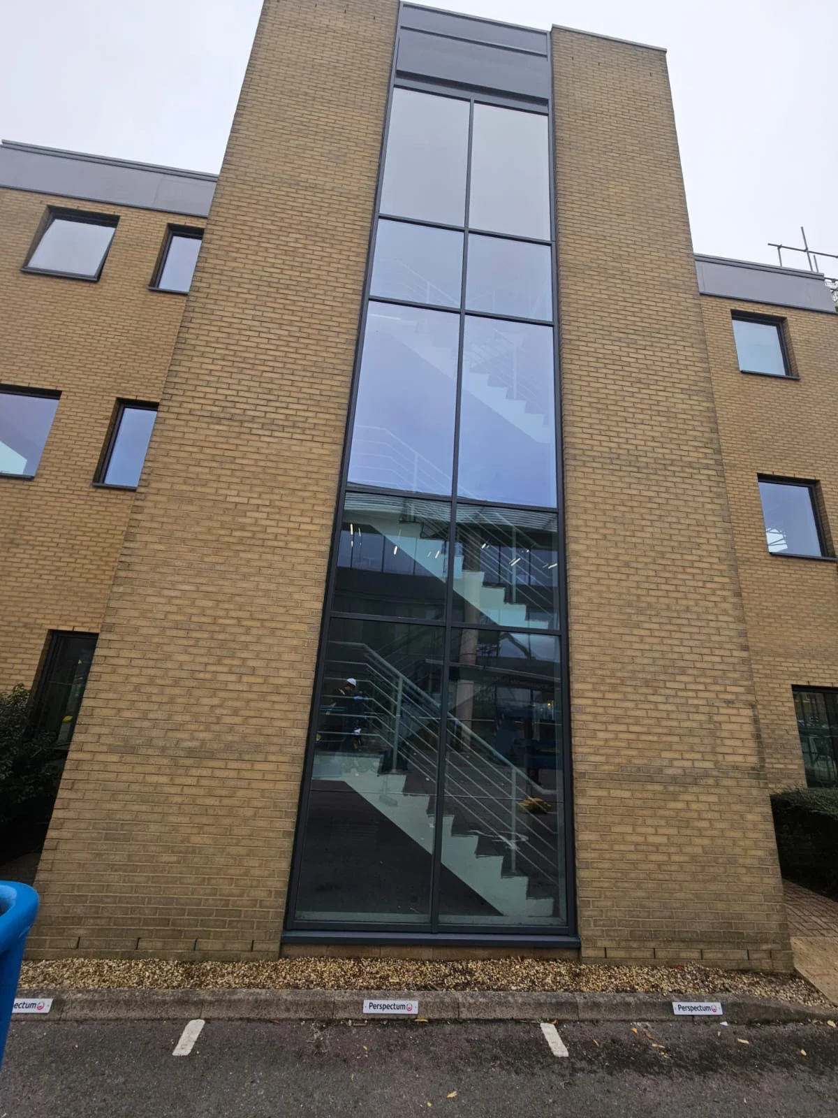Completed aluminium curtain wall and window respraying at Jubilee House, Oxford