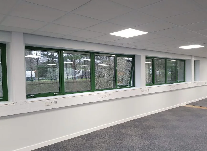 Office aluminium window frames before recoating