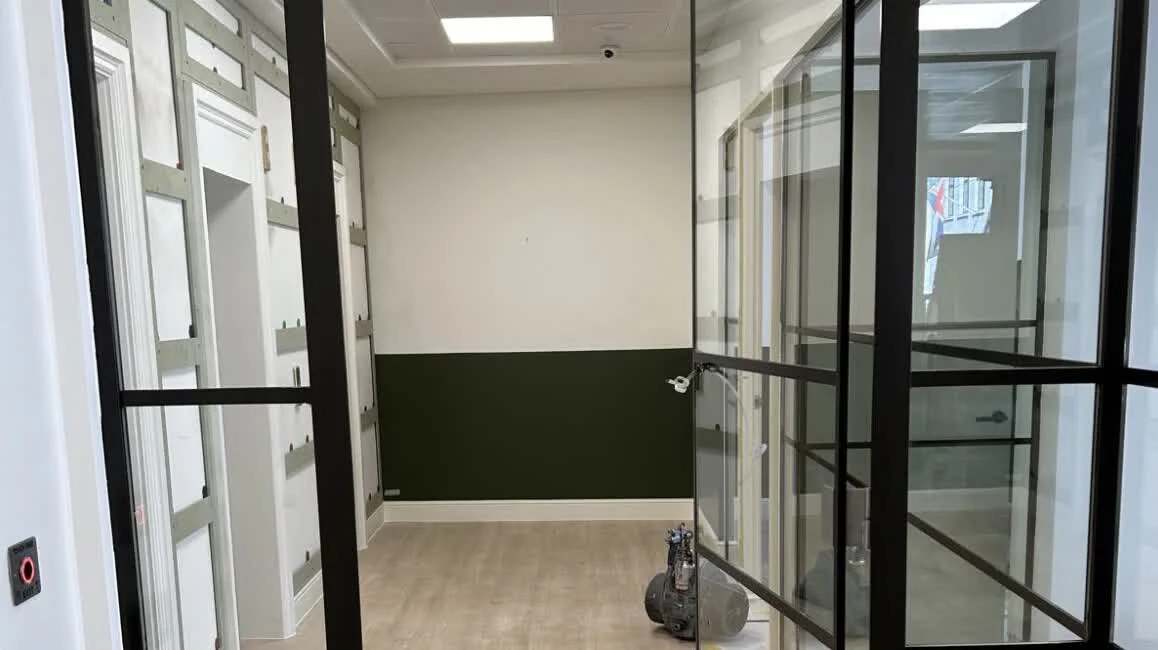 Office glass partition frames sprayed by Vanda Coatings