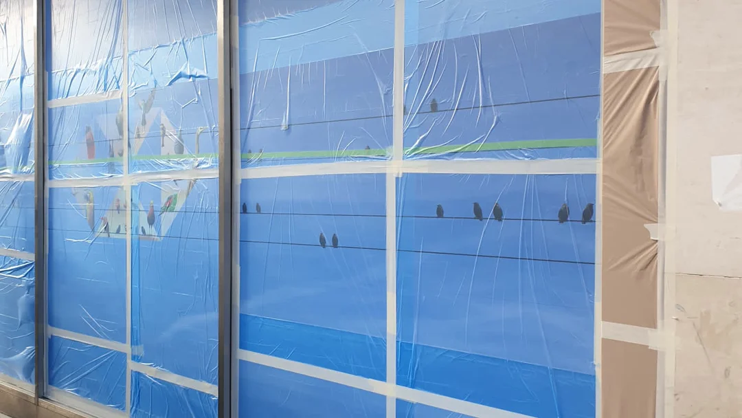 HSBC Liverpool shop front close-up of masked frames during preparation by Vanda Coatings