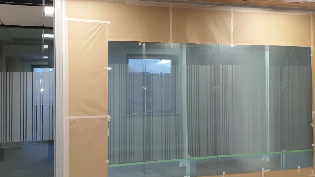 Office interior after spray painting by Vanda Coatings, smooth uniform finish on walls and partitions