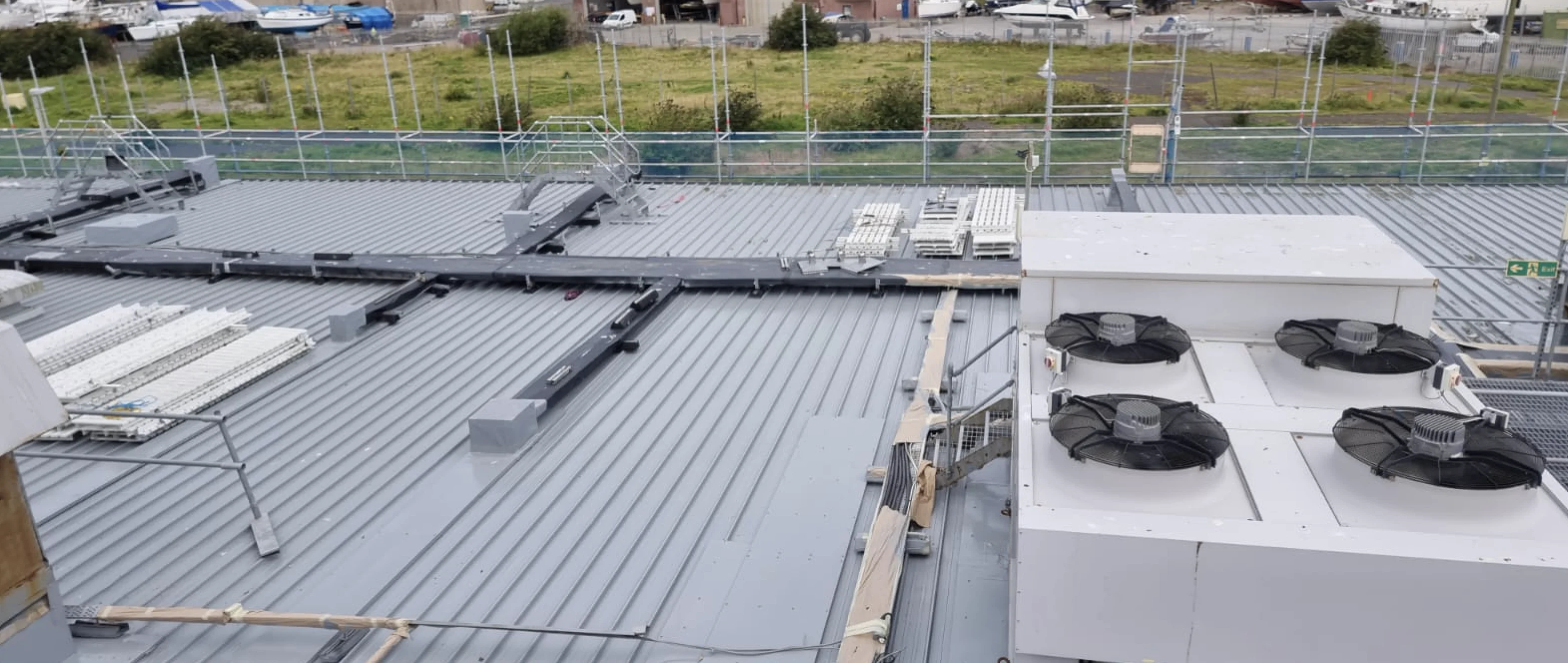 Recoated industrial roof with HVAC units, Cumbria, by Vanda Coatings